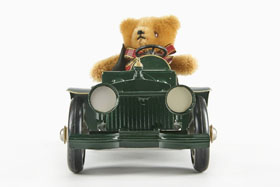 Tucher & Walther Hermann Teddy mit Rennwagen Harley Davidson